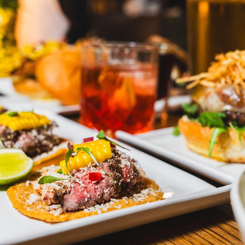 Steak tostada with corn and lime at Louie's Bar